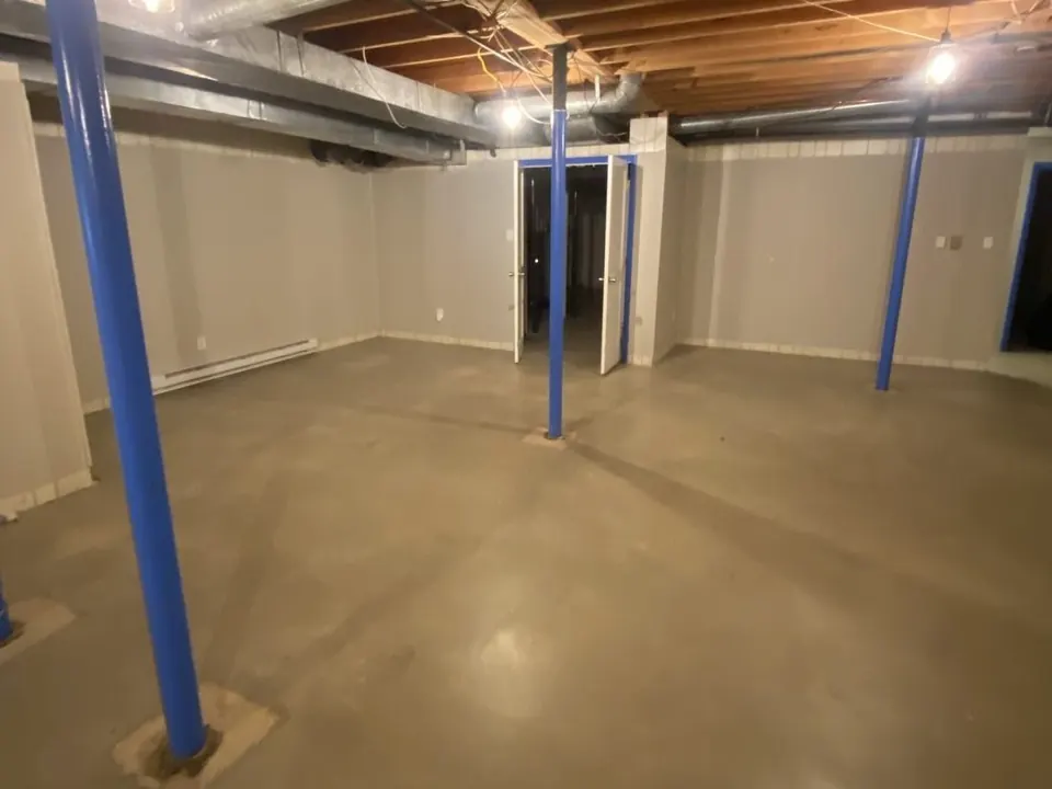 A basement after a Junk Doctors cleanout, cleared and empty